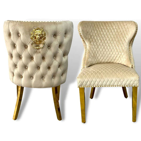 Pair of  Leather buttoned back dining chairs with lions head